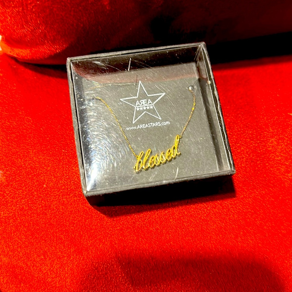 Gold colored costume jewelry brand new in box.
